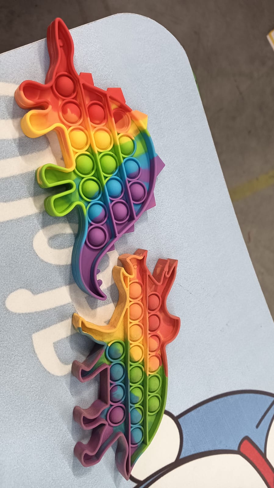 Vibrant rainbow push bubble toy for interactive fun